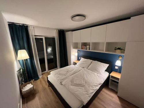 Postel nebo postele na pokoji v ubytování Baltic Nest - Dziwnów