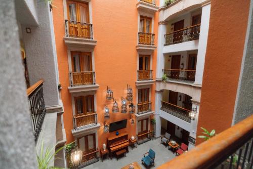 an view of an apartment building from a balcony at Hotel Santiago De Compostela - Guadalajara Centro Historico in Guadalajara