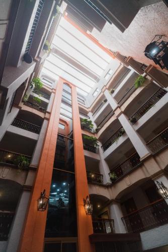a view of a building with a glass ceiling at Hotel Santiago De Compostela - Guadalajara Centro Historico in Guadalajara