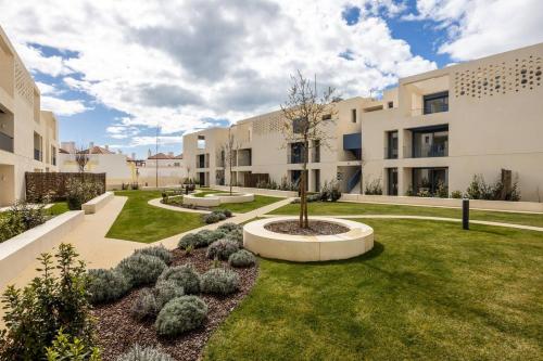 Modern 2BR Apartment with Garden & Pool