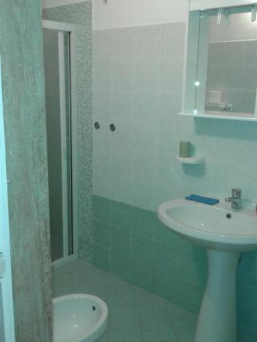 a bathroom with a shower and a sink at Casa Giovanni by My Home Apulia in Torre Lapillo