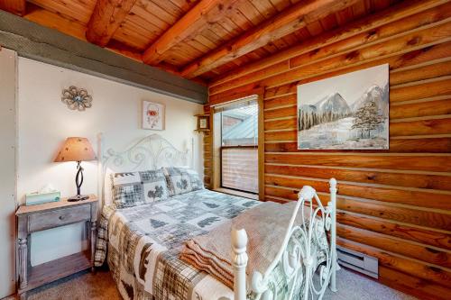Ένα ή περισσότερα κρεβάτια σε δωμάτιο στο Woodland Chalet