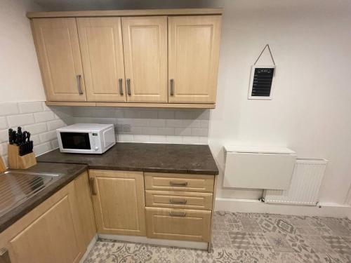 A kitchen or kitchenette at Boutique Accommodation in Central Location