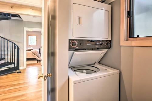 a bathroom with a washer and dryer in a room at Serene Hideaway with Views, 1 Mi to Hike and Ski! in Wintergreen