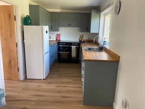 Photo de la galerie de l'établissement Pet Friendly 1Br Modernised Cottage with Fibre WiFi, à Bettyhill