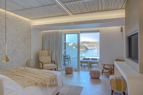 Postel nebo postele na pokoji v ubytování Icon Mykonos