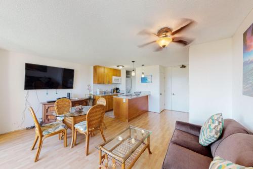 a living room with a couch and a table at Monte Vista 1704 in Honolulu