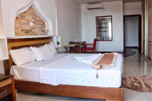 Ein Bett oder Betten in einem Zimmer der Unterkunft Shanzu Seabreeze Apartments