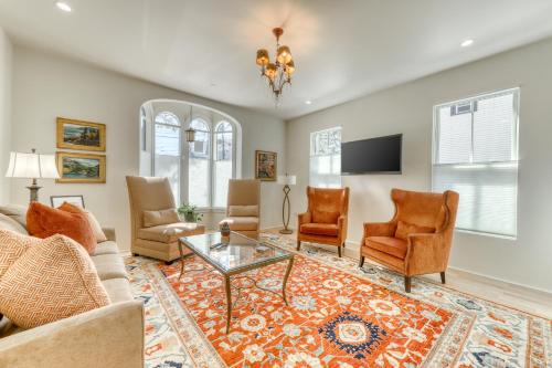 a living room with a couch and chairs and a table at Pearl of Portland in Portland