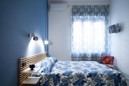 Ένα ή περισσότερα κρεβάτια σε δωμάτιο στο Amma B&B