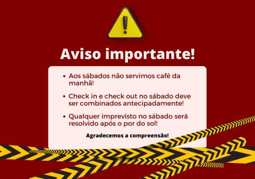 a warning sign with a caution tape on a red background at Paraíso do sul - Shangrilá in Pontal do Paraná