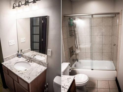 a bathroom with a sink and a toilet and a bath tub at Great Parkside Apt w Private Patio and Sun Deck in Cincinnati