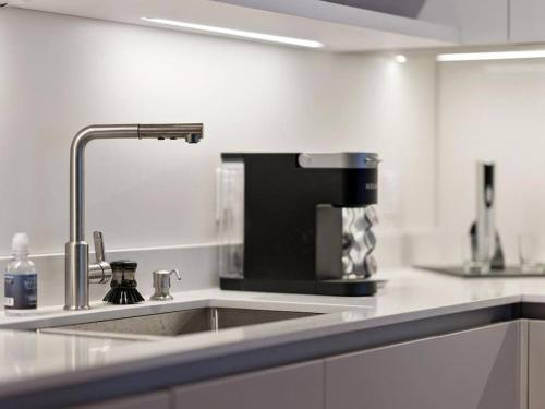 Kuchyň nebo kuchyňský kout v ubytování Findlay Suites Explore OTR with an Outdoor Deck
