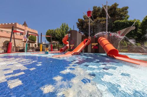 a water park with a water slide at Parklane, a Luxury Collection Resort & Spa, Limassol in Limassol