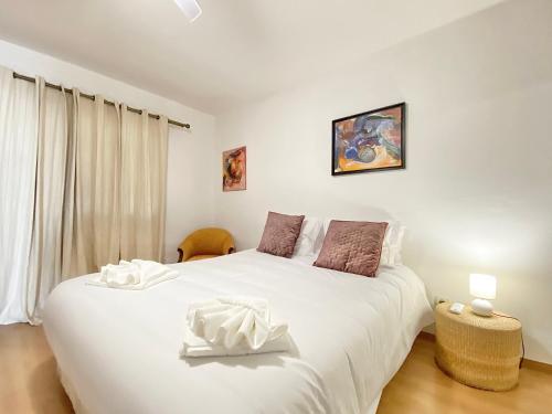 Postel nebo postele na pokoji v ubytování Sea Breeze Beach Penthouse - Praia Formosa