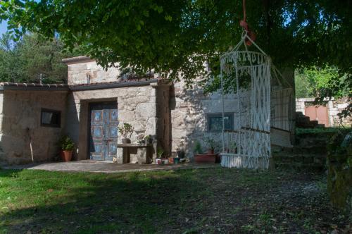 Aed väljaspool majutusasutust Casa D'Mina