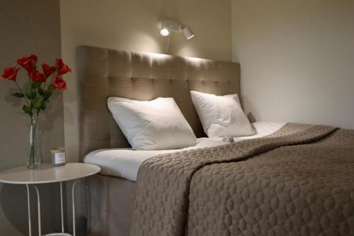 Postel nebo postele na pokoji v ubytování Prinshöjden Hotel - Smart Digital Apartments & Villas