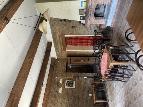 an overhead view of a restaurant with tables and chairs at Old Sighnaghi in Sighnaghi
