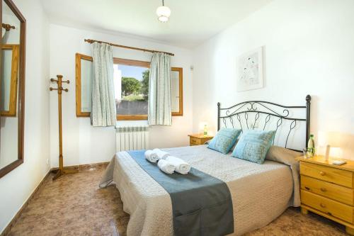 A bed or beds in a room at Villa Maria Celia by Villa Plus