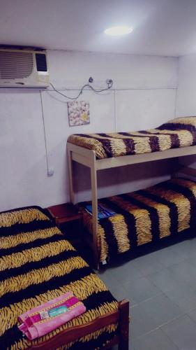 Un pat sau paturi într-o cameră la Mi Esperanza