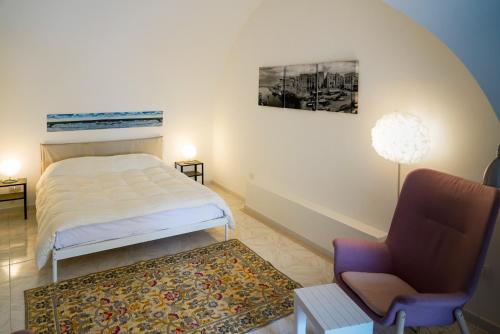 En eller flere senge i et værelse på Arco Felice