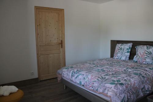Postel nebo postele na pokoji v ubytování Chambre d'hôtes Les Cinq Mésanges