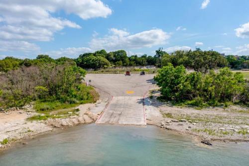 a bridge over a river on a road at Sunset Ridge 2King Beds Lake Hot Tub Pool in Canyon Lake