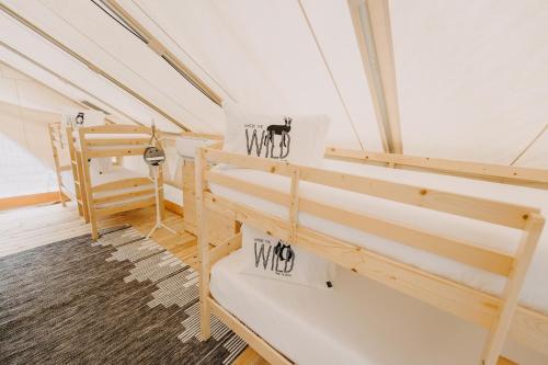 a room with bunk beds on a boat at Timberline Glamping at Amicalola Falls in Dawsonville