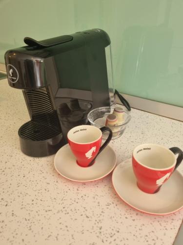 Tetera y cafetera en Nani