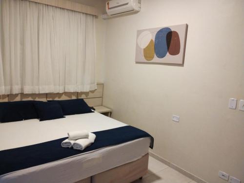 Ένα ή περισσότερα κρεβάτια σε δωμάτιο στο Italian Palace Hotel Rede Carlton