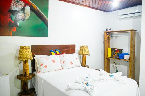 Postel nebo postele na pokoji v ubytování Pousada e Restaurante Amazonia