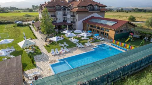 an aerial view of a hotel with a swimming pool at Thermal Hotel Seven Seasons in Banya
