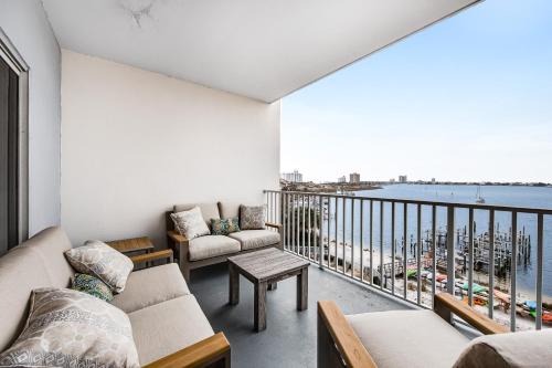 a living room with a view of the water at South Harbour 04C in Pensacola Beach
