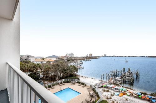 a balcony with a view of a body of water at South Harbour 04C in Pensacola Beach