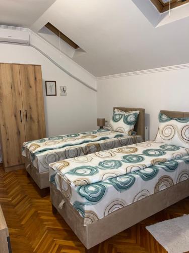 Postel nebo postele na pokoji v ubytování Guest Radic Apartment 2