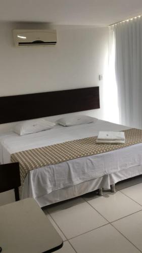 Katil atau katil-katil dalam bilik di Valparaiso Hotel