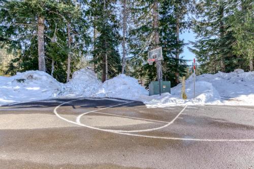 a basketball court with snow on the ground at #401 Grand Lodge South Penthouse in Government Camp