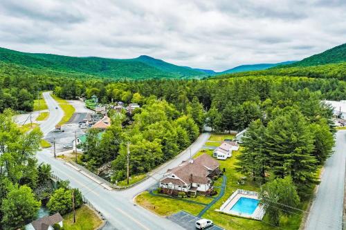 an aerial view of a house and a road with a pool at Riverbank Connecting Rooms 3 & 5 in Lincoln