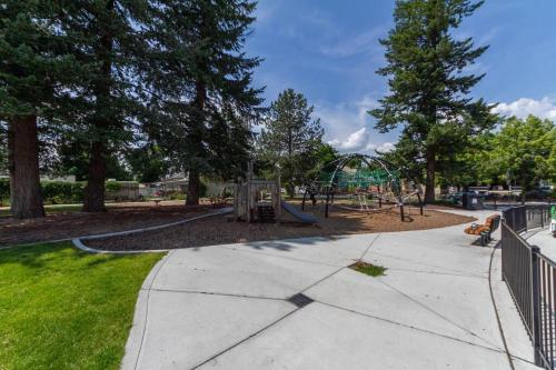 a park with a playground with a swing at Renovated 2 bed 2 bath Near Arena and Downtown in Spokane