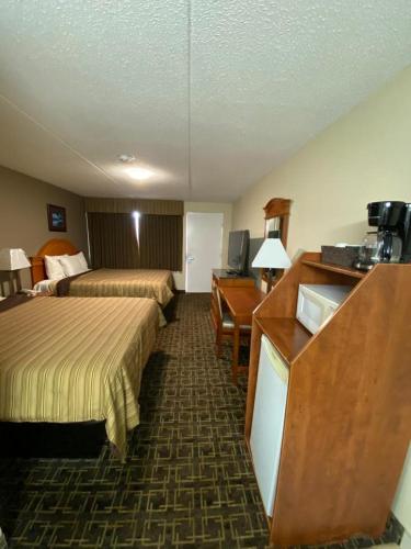 Postel nebo postele na pokoji v ubytování Angus Inn Motel