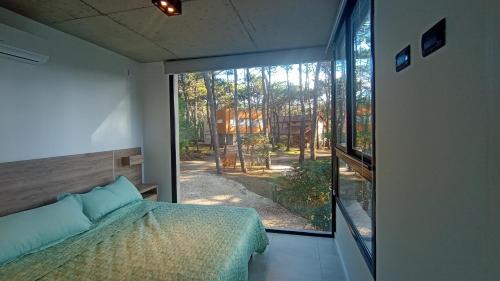 Ένα ή περισσότερα κρεβάτια σε δωμάτιο στο Orión