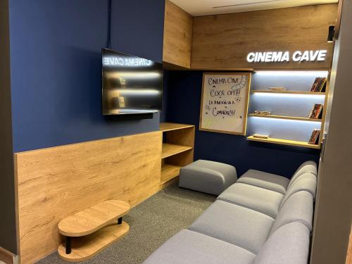 a dressing room with a couch and a chair at Los Patios Cool Living in Medellín