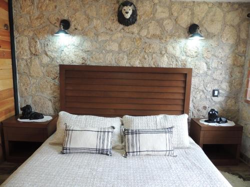Postel nebo postele na pokoji v ubytování Cabañas Big Mountain
