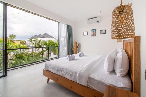Postel nebo postele na pokoji v ubytování Villa Vantage Canggu
