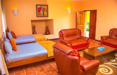 Zona de estar de Mountains of the Moon Hotel Fort Portal
