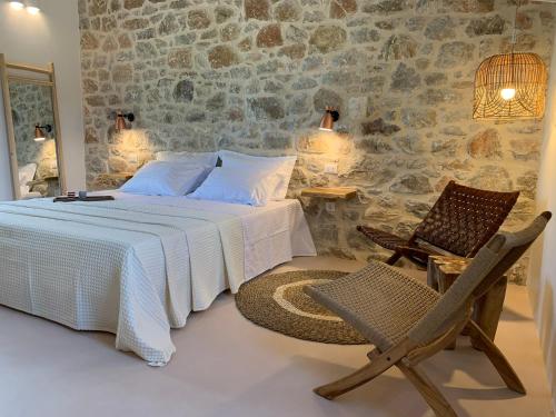 Ένα ή περισσότερα κρεβάτια σε δωμάτιο στο Inspiro Retreat Mani