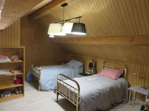 Cama ou camas em um quarto em Chalet Puyvalador station vue panoramique montagne