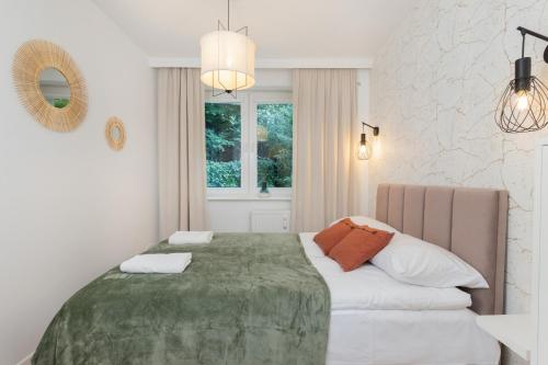 מיטה או מיטות בחדר ב-Gdynia Centrum Stylowy & Nowoczesny Apartament by Renters