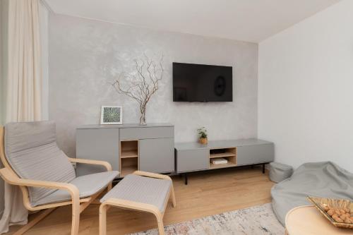 טלויזיה ו/או מרכז בידור ב-Gdynia Centrum Stylowy & Nowoczesny Apartament by Renters