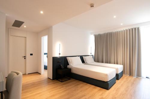 Letto o letti in una camera di Mango Luxury Resorts